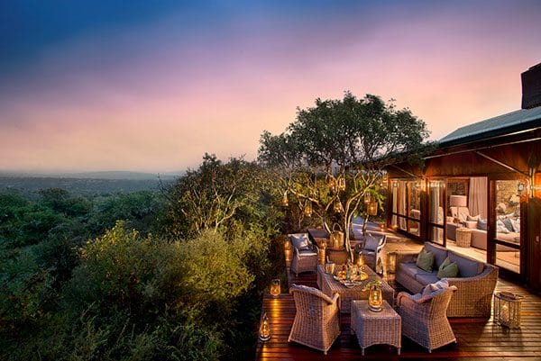 About 4 Luxury tented safari camp at sunrise with wildlife view